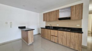 Zona de ropas y cocina en Torres de Baruc Florencia