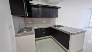 Vivienda en venta en Villa Erika detalles de iluminación en cocina.