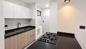 Apartamento acolsure Florencia cocina tipo americana con isla central